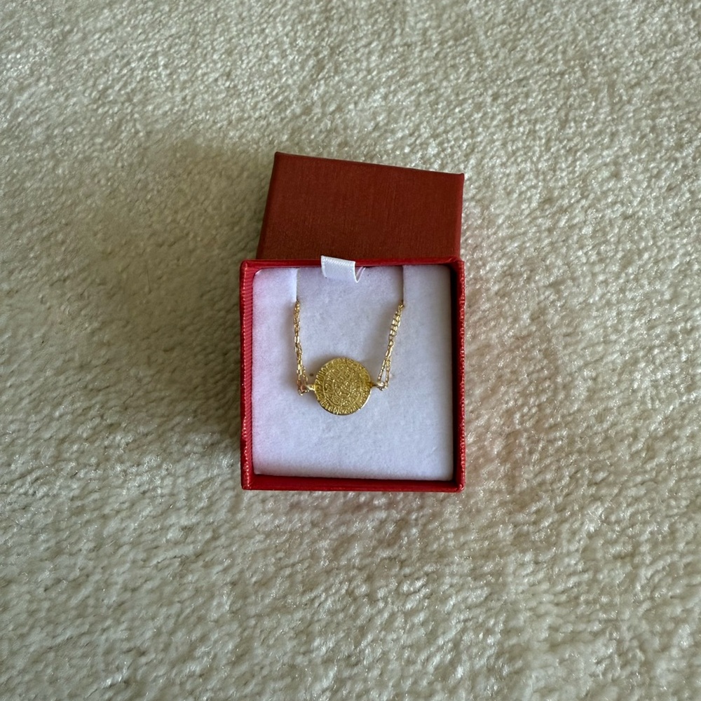 Greek coin gold tone bracelet with dainty chain